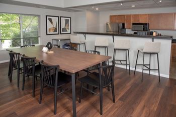 Upi community room with table seating and kitchen
